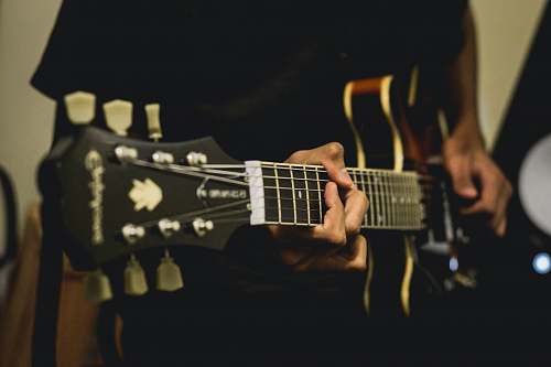 electric guitar person playing electric guitar guitar